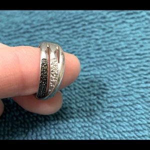 Silver ring with white and black stones